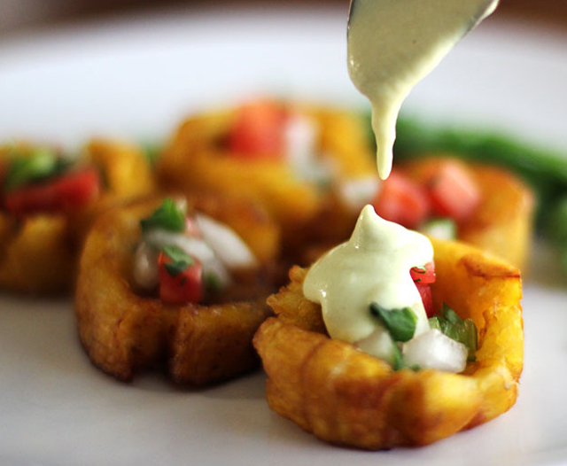 Fried Plantains - Tostones with pico de gallo and Hatch chile sauce