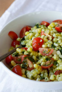 Summer corn salad with basil oil and cherry tomatoes