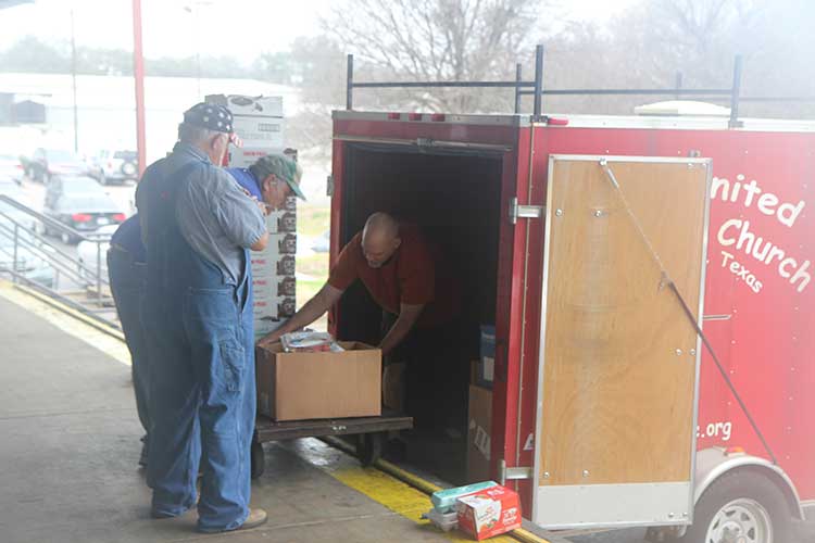Volunteers from First United Methodist pick up donations every week to distribute in Pfugerville