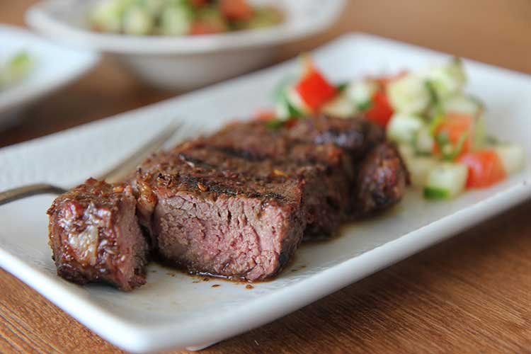 Costolette di controfiletto di agnello alla griglia di cumino