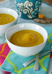 Carrot turmeric soup - add fresh turmeric rhizomes or dried turmeric to this simple carrot soup for a peppery bite, a golden color, and anti-inflammatory benefits! Hilahcooking.com