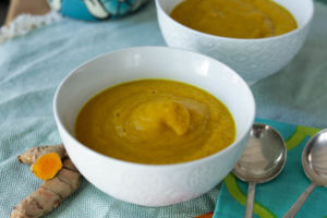 Carrot turmeric soup - add fresh turmeric rhizomes or dried turmeric to this simple carrot soup for a peppery bite, a golden color, and anti-inflammatory benefits! Hilahcooking.com