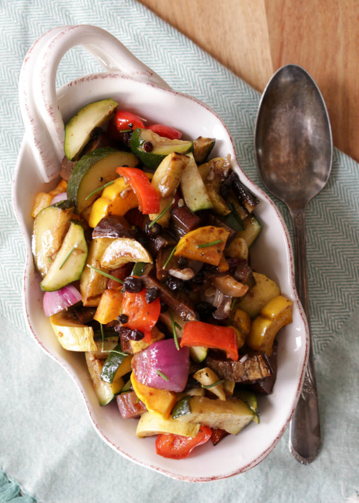 Caponata salad is a marinated roasted vegetables salad with balsamic vinegar, olive oil, garlic, rosemary and a little sweetness from dried currants