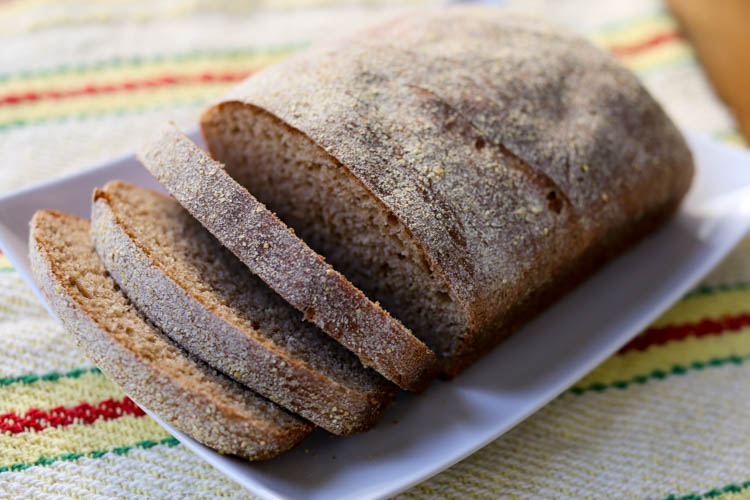 Whole Wheat English muffin bread - all the crispy crust of English muffin bread, made with 100% whole wheat flour. Make a great slicing and sandwich bread