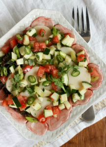 Hearts of Palm Salad with lime and lemon juice, olive oil, tomatoes and cucumber. This is a delicious brunch salad with the addition of chopped boiled eggs