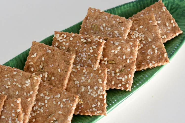 Simple, easy cracker recipe made with whole wheat flour, sesame seeds. This cracker recipe has only 5 ingredients and tastes very similar to ak-mak brand sesame crackers! Add fennel seed, caraway seed, cumin or celery seeds to customize your healthy homemade crackers