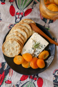 Rosemary-honey marinated dried apricots are a unique, delicious and easy addition to a holiday cheese plate!