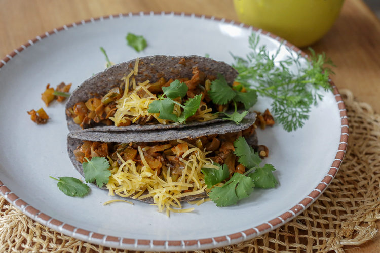 Vegan crispy taco filling with no beans! Mushrooms, vegetables, spices, and some walnuts or pecans for healthy fats and great texture. Serve this vegan picadillo inside crispy taco shells or soft tortillas with your choice of toppings. Also great as a taco salad!