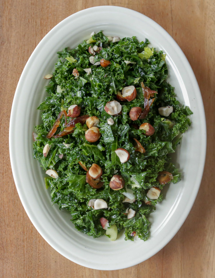 Date and kale salad: massaged kale salad with olive oil, lemon juice, pomegranate molasses, dates, celery, nuts and a bit of hot peppers