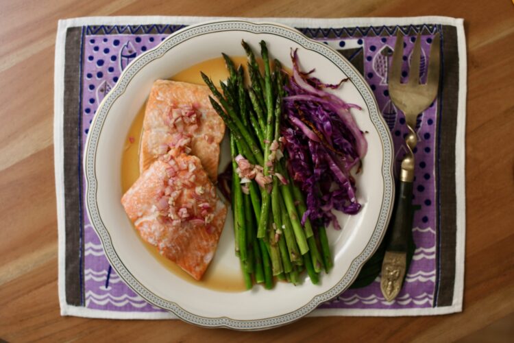 Roasted sheet pan salmon and asparagus dinner with pomegranate mignonette sauce