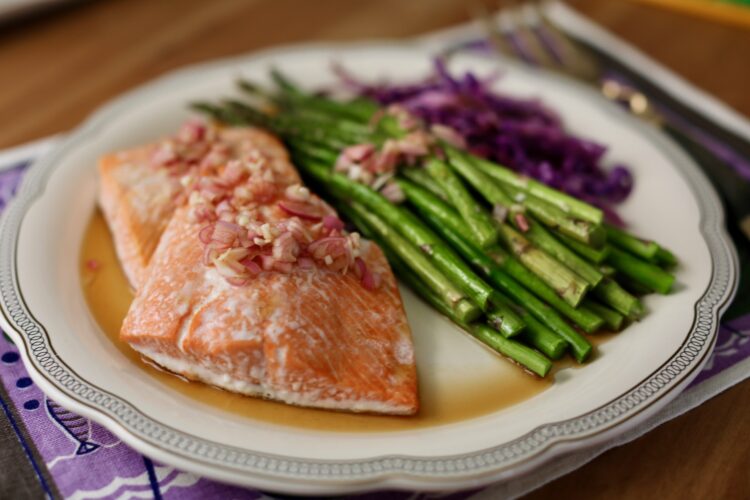 Roasted salmon and asparagus sheet pan dinner with pomegranate mignonette sauce