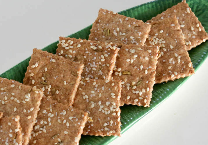 Simple, easy cracker recipe made with whole wheat flour, sesame seeds. This cracker recipe has only 5 ingredients and tastes very similar to ak-mak brand sesame crackers! Add fennel seed, caraway seed, cumin or celery seeds to customize your healthy homemade crackers
